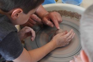 A new way to “play in the mud:” younger campers experiment in this summer’s first 'Play in Clay' camp at Tyler Park Center for the Arts