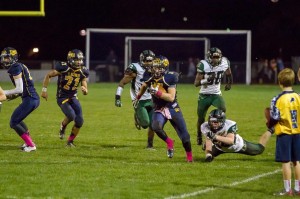 New Hope's Brendan Shadle eludes DC defense with help from lineman Marcus Hems (Photo: Kim Hildebrandt)
