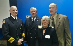Maddie Stubbs with (L to R) Fire Chief Matt Taylor, Eagle Fire Company President Keith McMillen, and Fire Police Officer John Dwyer
