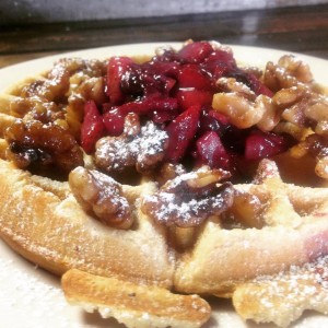 Blueberry and Stawberry Waffle w ith warm berry compote, walnuts, and bacon ($12).