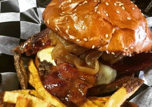 Magic Monster Burger with snow roller onions, Vermont sharp cheddar, and candied maple bacon ($12).