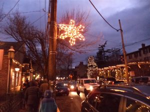 Besides breathtaking merchant display, the borough usually installs illuminated snowflakes (foreground) and small banners (background).